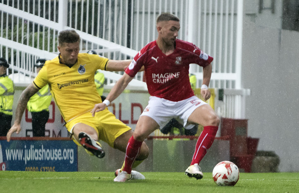 Swindon Town's Luke Williams defends Anton Rodgers' display against Chesterfield