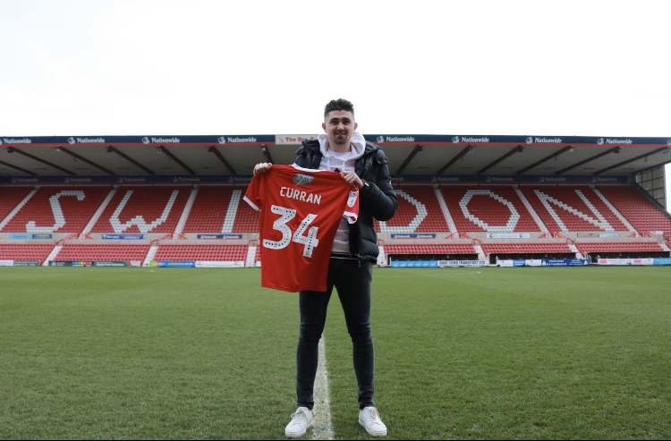 REACTION: TAYLOR CURRAN SIGNS FOR SWINDON TOWN