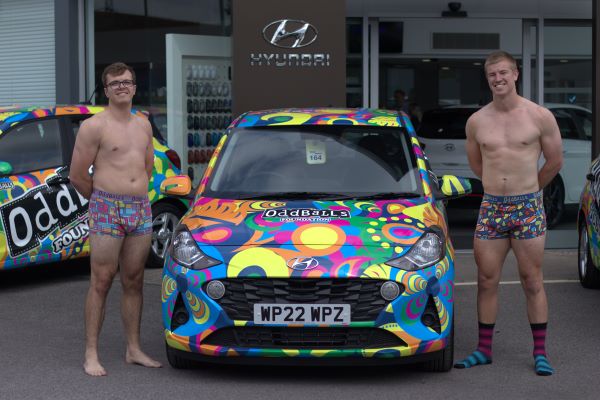 Young men strip to underwear for car handover at Pebley Beach