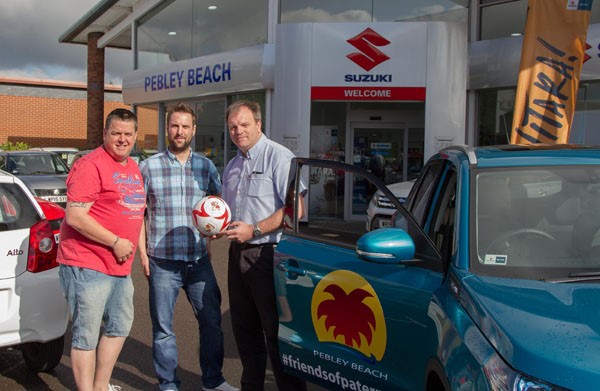 Football-Mad family Do The 92 in Suzuki from Pebley Beach