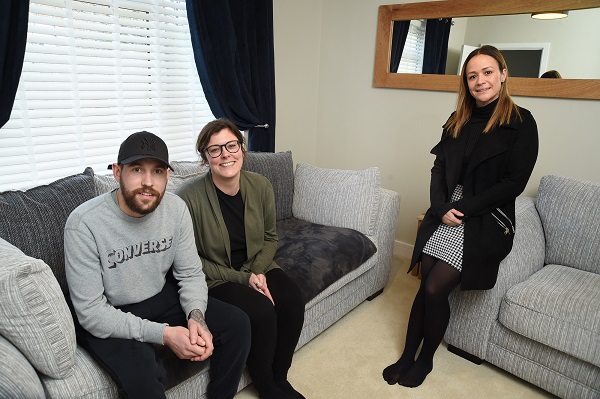 Damien and Samantha at their home in Swindon alongside Bellway South West Head of Customer Care, Shauna Humphreys