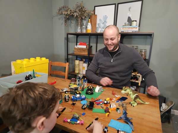 Aaron Lee with some of his childrensâ€™ LEGO! He's pictured with his eldest son Henry. 