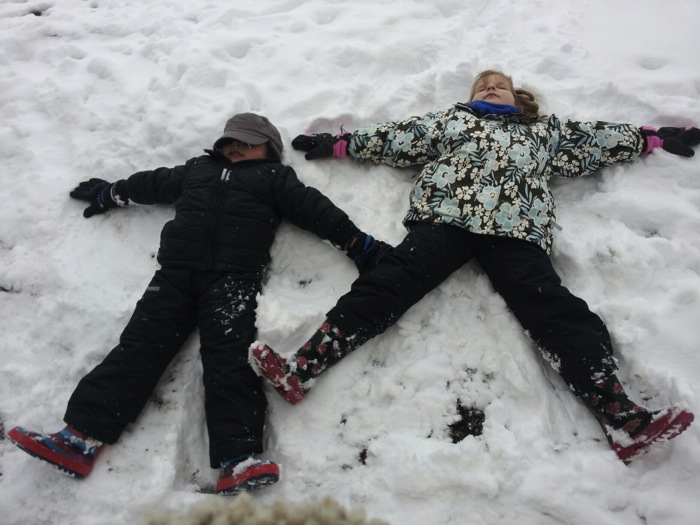 Tui & Stanley make snow angels - Sarah Jane Jackson
